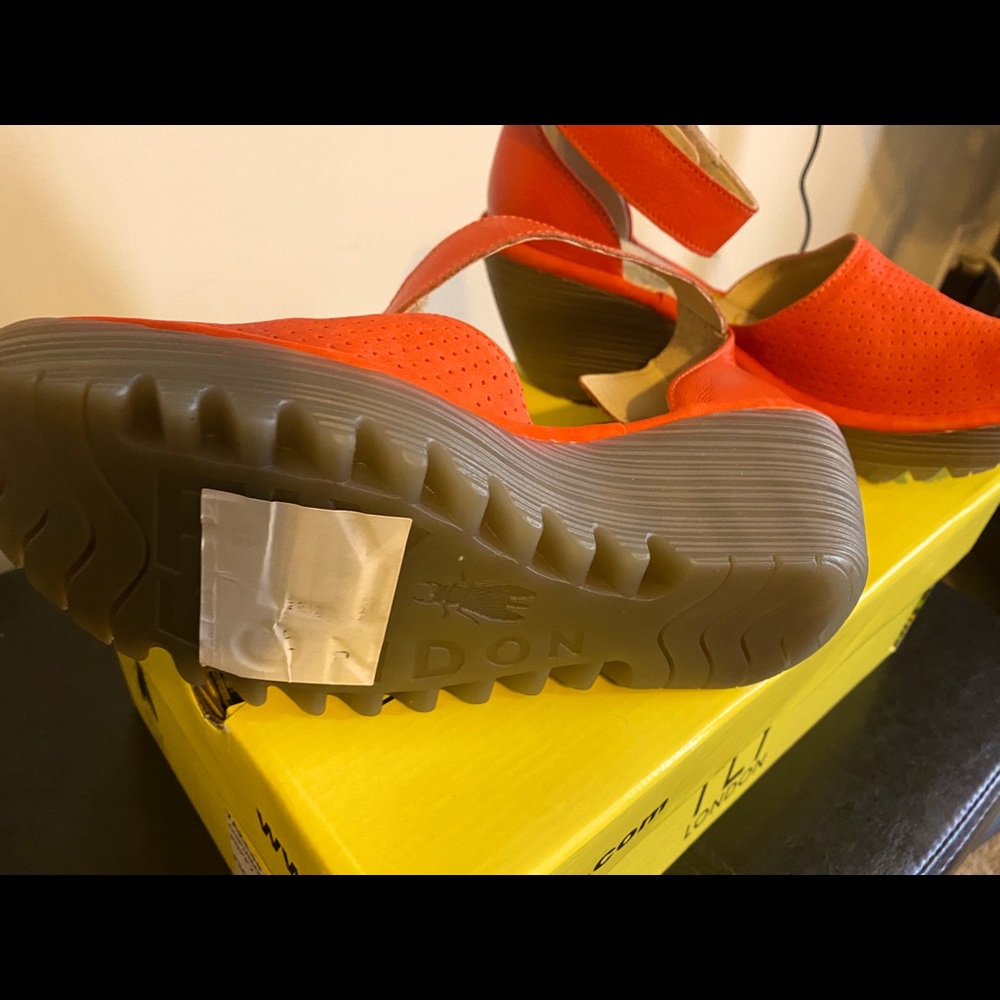 Brand new...never worn FLY Orange Suede Sandals